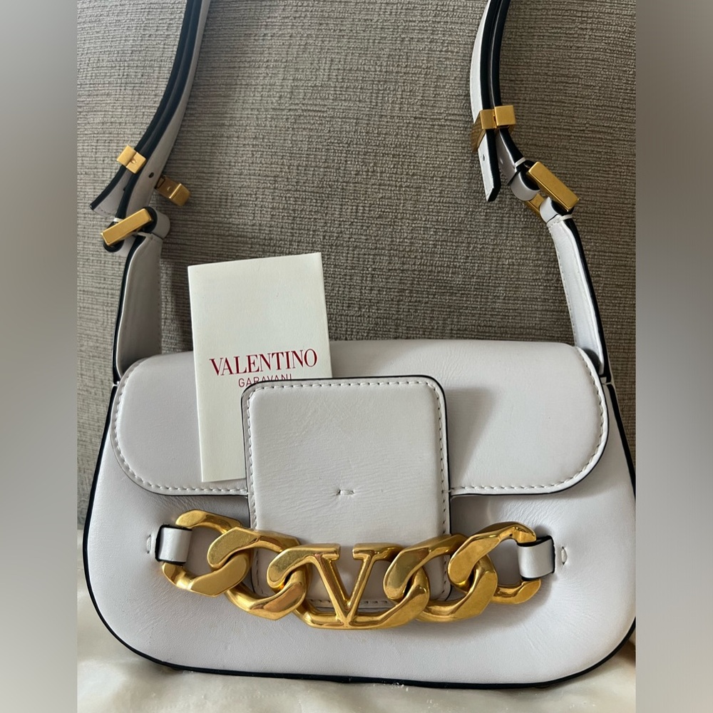 Valentino Vlogo Chain Leather Bag white calf leather with gold tone hardware.